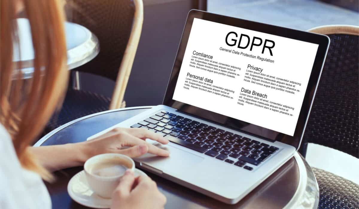 GDPR concept woman reading about General Data Protection Regulation private information